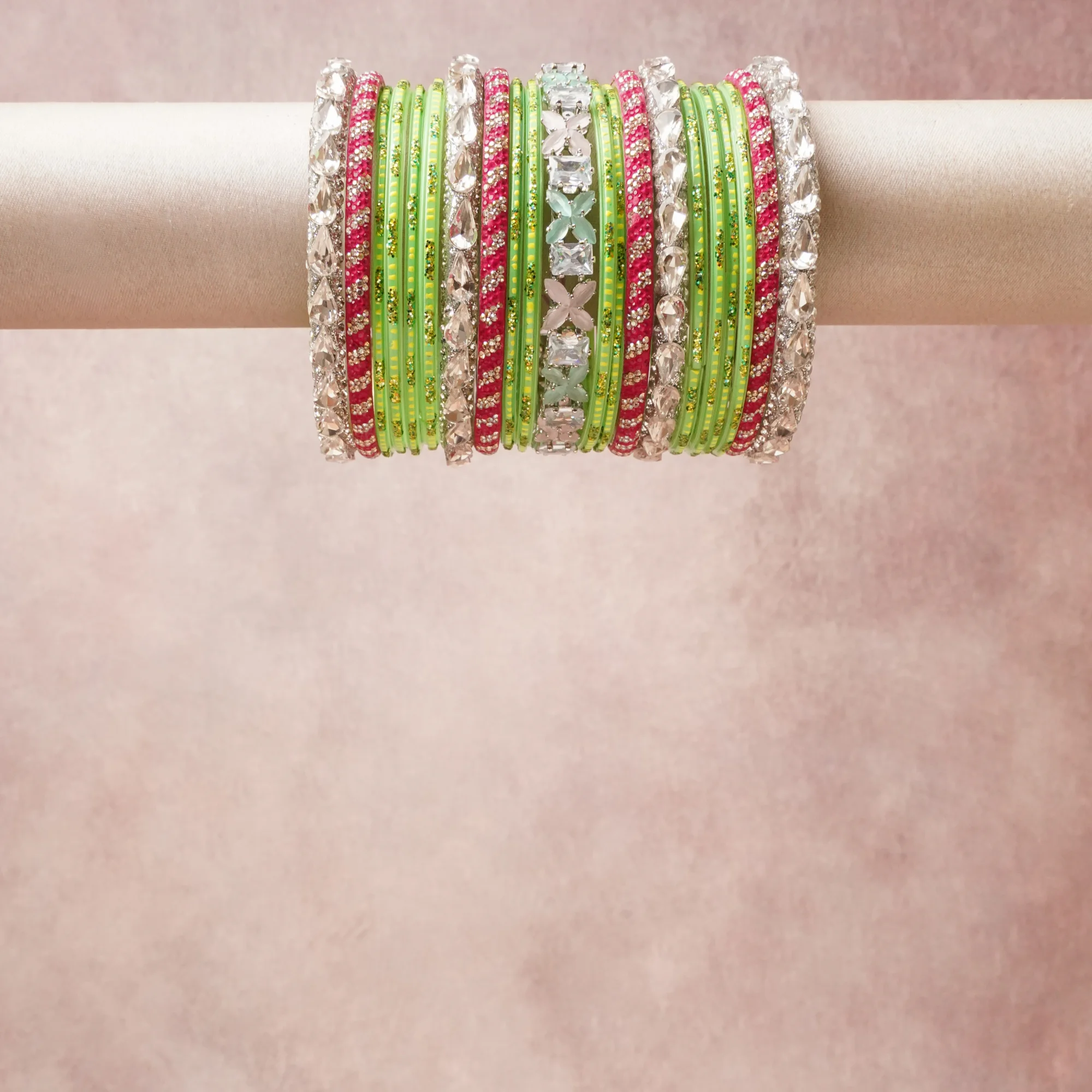 A grounding Vibrant Green forms the heart of the set, while touches of Chartreuse Sparkle, White Sparkle, Light Aqua add charm.

A thoughtful composition of Lacquered Metal, Glitter, Silver-Toned Alloy, Cubic Zirconia, designed to feel complete without being heavy.
Each element layers seamlessly, creating a look that is refined, wearable and quietly striking.